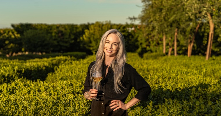 In frame: Ellison Woddorf, Founder of Susurrus Sparkling Tea